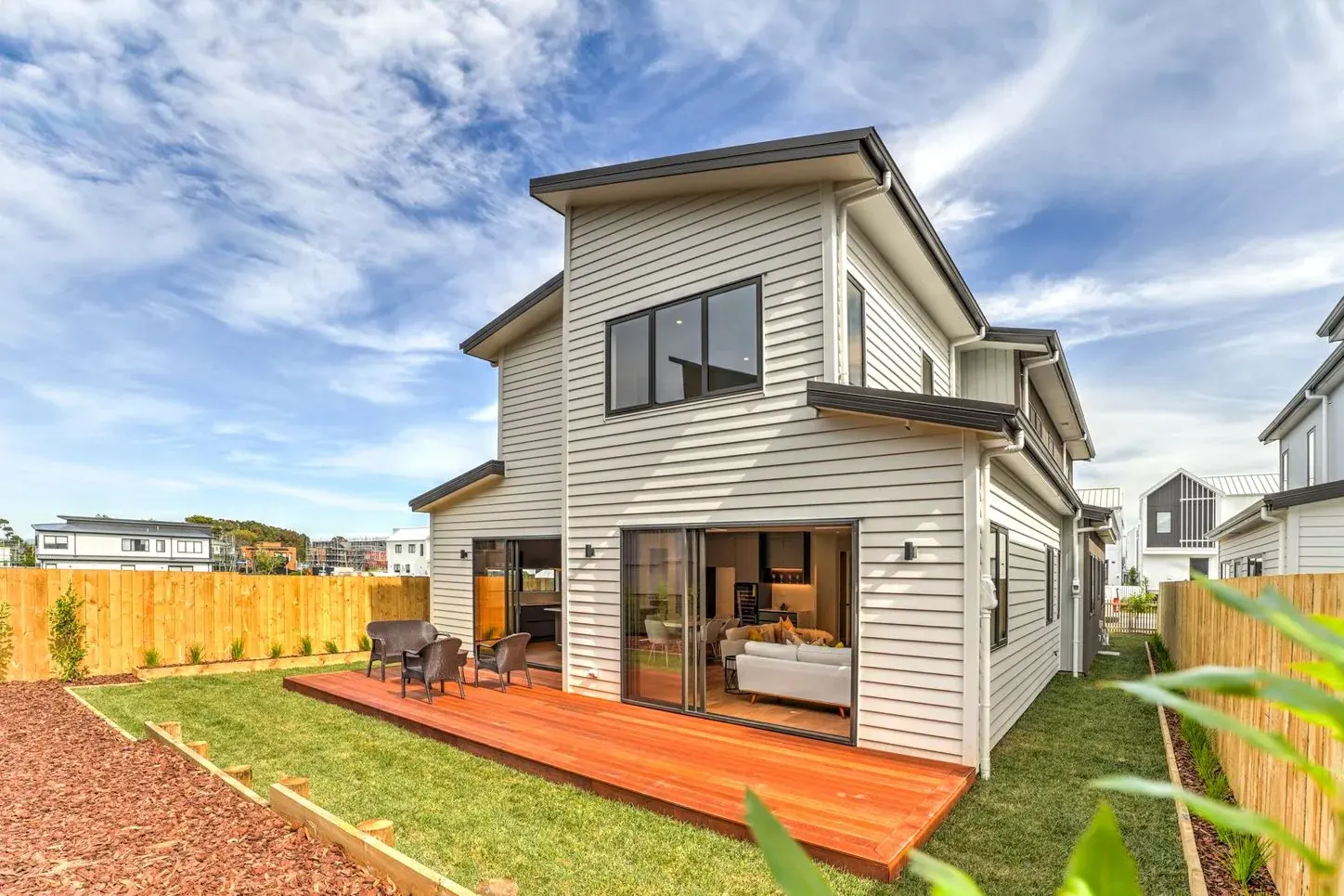 Outdoor deck and rear exterior at 4 Pukeko Road, Hobsonville