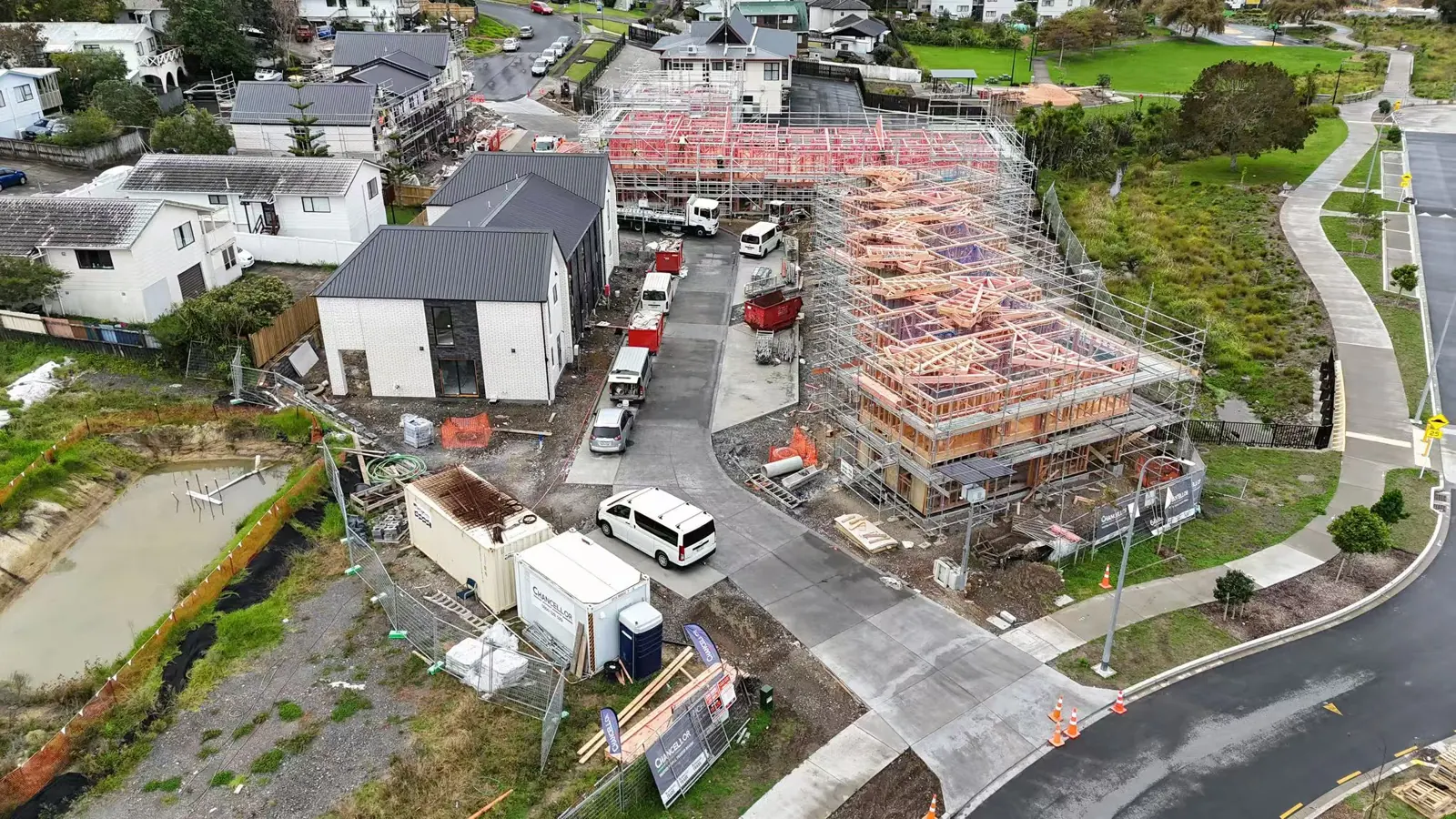 Multi-unit construction site with shared access and homes at different build stages